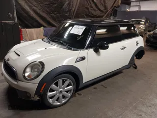2010 MINI Hardtop S with VIN WMWMF7C5XATX41382, listed as a IAAI auction lot 40558359 with 96,158 mi miles and . Bid and sale history available at DreamBid. Image 2.