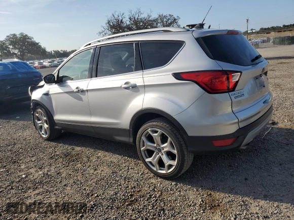 2019 Ford Escape Titanium with VIN 1FMCU9J92KUA78127, listed as a Copart auction lot 58488255 with 82,956 mi miles and Non repairable. Bid and sale history available at DreamBid. Image 2.