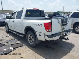 2012 Nissan Titan SL with VIN 1N6BA0EC1CN326919, listed as a IAAI auction lot 42630368 with 230,215 mi miles and . Bid and sale history available at DreamBid. Image 3.