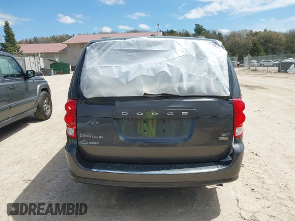 2018 Dodge Grand Caravan SXT z VIN 2C4RDGCG8JR129835, wystawiony jako IAAI lot #42190326 z przebiegiem 81 818 mil mil oraz . Historia ofert i sprzedaży dostępna na DreamBid. Obrazek 16.