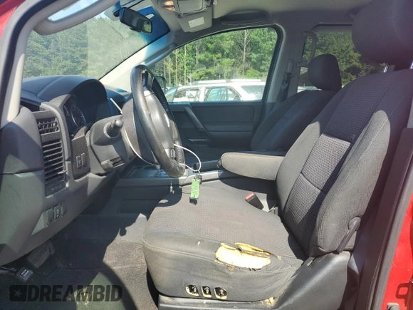 2010 Nissan Titan SE with VIN 1N6BA0ED3AN310467, listed as a Copart auction lot 62888895 with 230,343 mi miles and Salvage title. Bid and sale history available at DreamBid. Image 7.