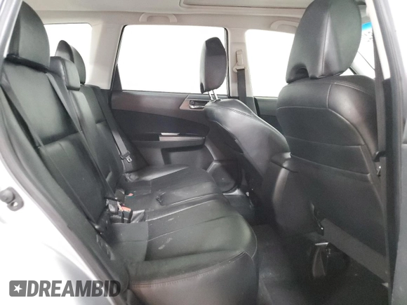 2013 Subaru Forester X Limited z VIN JF2SHAECXDH424658, wystawiony jako Copart lot #57326425 z przebiegiem 138 459 mil mil oraz Szkoda całkowita • Salvage title. Historia ofert i sprzedaży dostępna na DreamBid. Obrazek 11.