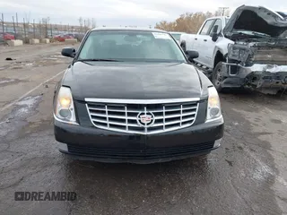 2006 Cadillac DTS w/1SC with VIN 1G6KD57Y96U251691, listed as a IAAI auction lot 41086147 with 128,959 mi miles. Bid and sale history available at carsss.com. Image 12.