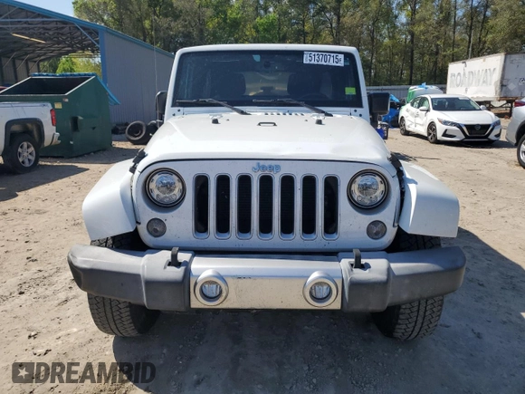 2017 Jeep Wrangler Unlimited Sahara with VIN 1C4BJWEG4HL504429, listed as a Copart auction lot 51370715 with 52,286 mi miles and Salvage Title. Bid and sale history available at carsss.com. Image 5.