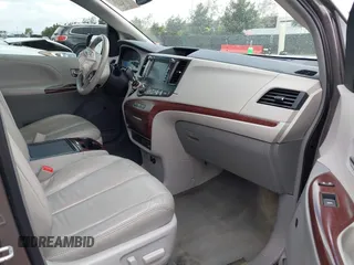 2014 Toyota Sienna XLE with VIN 5TDYK3DC7ES517206, listed as a IAAI auction lot 41945572 with 128,743 mi miles and . Bid and sale history available at DreamBid. Image 5.