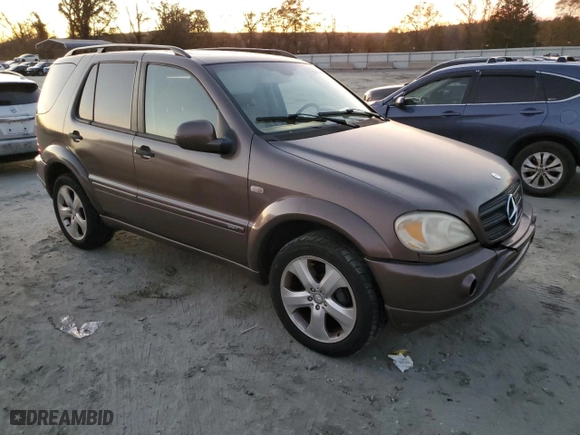 2001 Mercedes-Benz M-Class with VIN 4JGAB72E41A257282, listed as a Copart auction lot 82562194 with 149,689 mi miles and Non Repairable. Bid and sale history available at carsss.com. Image 4.