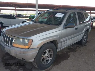 1999 Jeep Grand Cherokee Laredo with VIN 1J4G258S7XC679151, listed as a IAAI auction lot 42500706 with Not provided miles and . Bid and sale history available at DreamBid. Image 2.