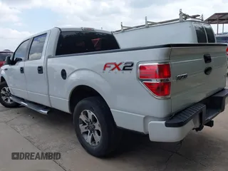 2014 Ford F-150 XL with VIN 1FTFW1CF1EFD12959, listed as a IAAI auction lot 42422218 with 234,818 mi miles and . Bid and sale history available at DreamBid. Image 3.