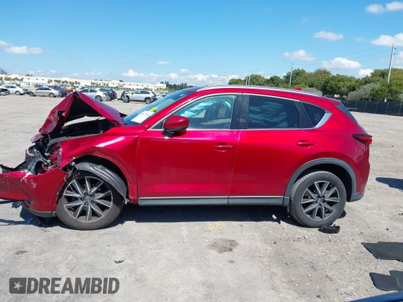 2018 Mazda CX-5 Grand Touring with VIN JM3KFADM0J0377091, listed as a IAAI auction lot 41677544 with 91,758 mi miles. Bid and sale history available at carsss.com. Image 15.