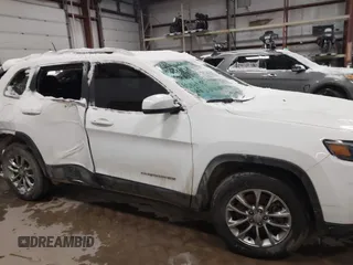 2020 Jeep Cherokee Altitude with VIN 1C4PJMLX1LD631137, listed as a IAAI auction lot 41316551 with 72,021 mi miles and . Bid and sale history available at carsss.com. Image 13.