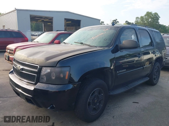 2008 Chevrolet Tahoe LS with VIN 1GNFC13C38R237657, listed as a IAAI auction lot 42620061 with 290,899 mi miles and . Bid and sale history available at DreamBid. Image 2.