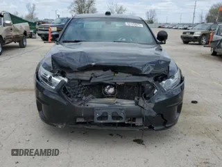 2015 Ford Police Interceptor with VIN 1FAHP2MK7FG159819, listed as a Copart auction lot 53123975 with 136,518 mi miles and Salvage title. Bid and sale history available at DreamBid. Image 5.