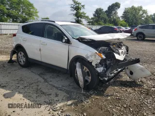 2014 Toyota RAV4 LE with VIN JTMZFREV9EJ020862, listed as a Copart auction lot 63983635 with 170,148 mi miles and Salvage title. Bid and sale history available at DreamBid. Image 4.