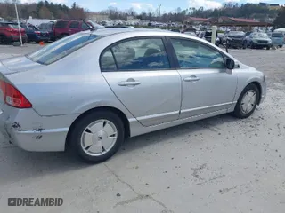 2007 Honda Civic Hybrid with VIN JHMFA36297S019581, listed as a IAAI auction lot 41879187 with 87,297 mi miles. Bid and sale history available at carsss.com. Image 4.