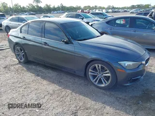 2014 BMW 3 Series 328i with VIN WBA3C1C52EK116956, listed as a IAAI auction lot 41907691 with 125,856 mi miles. Bid and sale history available at carsss.com. Image 1.