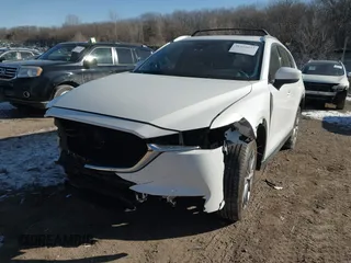 2020 Mazda CX-5 Grand Touring with VIN JM3KFADM5L1815374, listed as a IAAI auction lot 41416077 with 44,190 mi miles. Bid and sale history available at carsss.com. Image 2.
