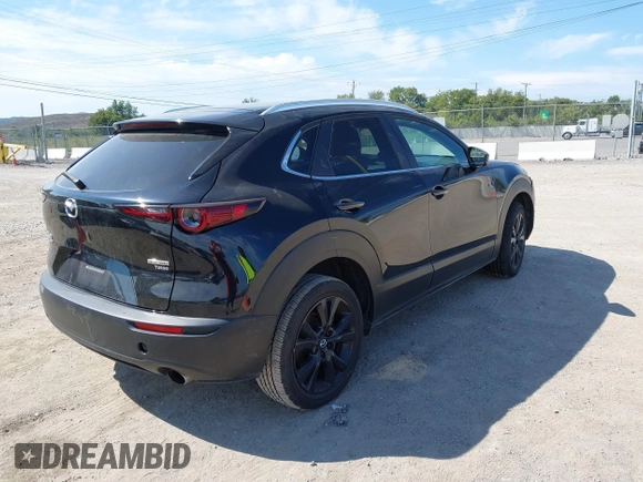 2022 Mazda CX-30 2.5 Turbo with VIN 3MVDMBAY4NM452705, listed as a IAAI auction lot 40101452 with 18,873 mi miles and . Bid and sale history available at DreamBid. Image 4.