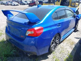 2019 Subaru WRX STI with VIN JF1VA2R65K9826529, listed as a IAAI auction lot 41753889 with 64,040 mi miles and . Bid and sale history available at DreamBid. Image 4.