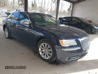 2013 Chrysler 300 with VIN 2C3CCAET7DH673242, listed as a IAAI auction lot 41785948 with 135,968 mi miles. Bid and sale history available at carsss.com. Image 1.