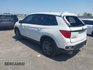 2023 Honda Passport EX-L z VIN 5FNYF8H57PB006499, wystawiony jako IAAI lot #42036371 z przebiegiem 51 404 mil mil oraz . Historia ofert i sprzedaży dostępna na DreamBid. Obrazek 3.