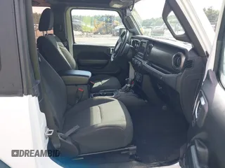 2019 Jeep Wrangler Sport S z VIN 1C4GJXAG0KW583315, wystawiony jako IAAI lot #39990649 z przebiegiem 32 768 mil mil oraz . Historia ofert i sprzedaży dostępna na DreamBid. Obrazek 5.