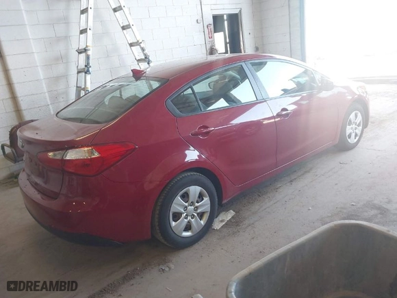 2015 Kia Forte LX with VIN KNAFX4A65F5393177, listed as a IAAI auction lot 42038738 with 113,355 mi miles. Bid and sale history available at carsss.com. Image 4.