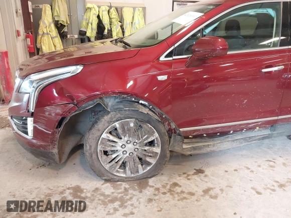2018 Cadillac XT5 Premium Luxury AWD z VIN 1GYKNFRS6JZ114464, wystawiony jako IAAI lot #42320302 z przebiegiem 61 231 mil mil oraz . Historia ofert i sprzedaży dostępna na DreamBid. Obrazek 6.