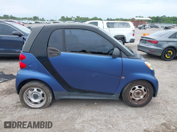2013 Smart fortwo Pure with VIN WMEEJ3BA6DK664115, listed as a IAAI auction lot 42412198 with 64,522 mi miles and . Bid and sale history available at DreamBid. Image 13.