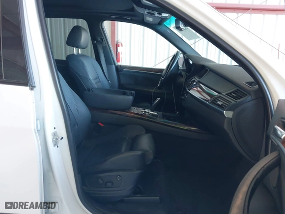 2007 BMW X5 3.0si with VIN 5UXFE43507L018015, listed as a IAAI auction lot 41880668 with 150,329 mi miles. Bid and sale history available at carsss.com. Image 5.