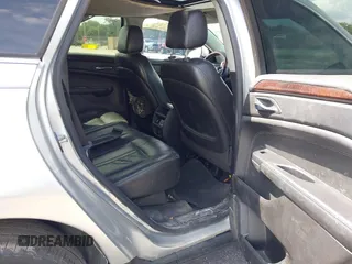 2013 Cadillac SRX Luxury Collection with VIN 3GYFNCE39DS512235, listed as a IAAI auction lot 38873243 with 133,378 mi miles and . Bid and sale history available at DreamBid. Image 8.