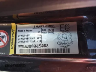 2006 Smart fortwo z VIN WMEAJ00F66J237683, wystawiony jako Copart lot #46675335 z przebiegiem 155 160 mil mil oraz Szkody całkowita. Historia ofert i sprzedaży dostępna na DreamBid. Obrazek 13.