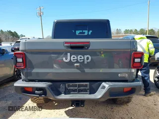 2020 Jeep Gladiator Overland z VIN 1C6HJTFG4LL143369, wystawiony jako IAAI lot #41827409 z przebiegiem 77 752 mil mil oraz . Historia ofert i sprzedaży dostępna na DreamBid. Obrazek 16.