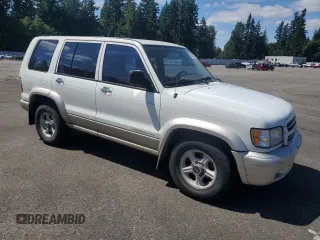 2000 Isuzu Trooper S with VIN JACDJ58X1Y7J12904, listed as a Copart auction lot 63835695 with 228,213 mi miles and Clean title. Bid and sale history available at DreamBid. Image 4.
