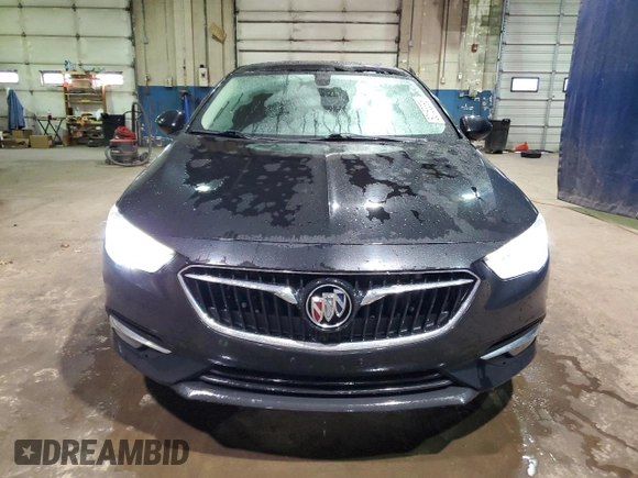 2018 Buick Regal Essence with VIN W04GP6SX8J1047130, listed as a Copart auction lot 50153395 with 97,679 mi miles and Clean title. Bid and sale history available at DreamBid. Image 5.