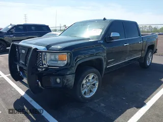 2014 GMC Sierra 1500 Denali z VIN 3GTU2WEC2EG302474, wystawiony jako IAAI lot #41881222 z przebiegiem 197 221 mil mil oraz . Historia ofert i sprzedaży dostępna na DreamBid. Obrazek 2.