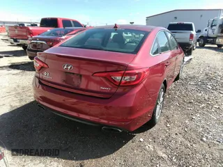 2016 Hyundai Sonata Sport z VIN 5NPE34AF8GH309672, wystawiony jako IAAI lot #42150848 z przebiegiem 100 893 mil mil oraz . Historia ofert i sprzedaży dostępna na DreamBid. Obrazek 4.