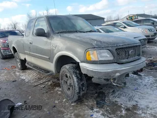 2003 Ford F-150 XL with VIN 1FTRX18W63NA62642, listed as a IAAI auction lot 41407767 with 1 mi miles. Bid and sale history available at carsss.com. Image 1.