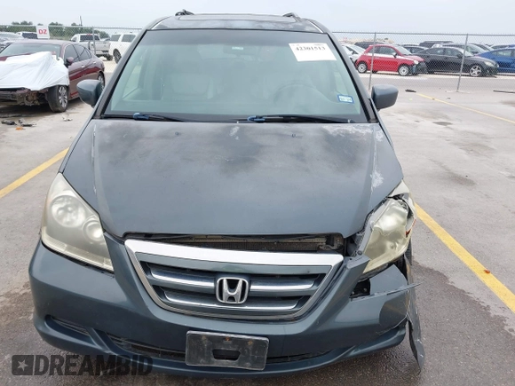 2005 Honda Odyssey EX-L with VIN 5FNRL38775B110232, listed as a IAAI auction lot 42301513 with 277,389 mi miles and . Bid and sale history available at DreamBid. Image 6.