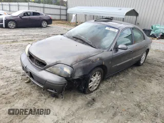2004 Mercury Sable LS Premium with VIN 1MEHM55S74A622379, listed as a Copart auction lot 73611144 with 0 mi miles and Salvage Title. Bid and sale history available at carsss.com. Image 1.