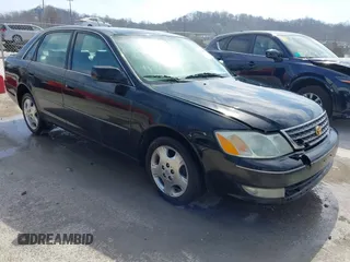 2004 Toyota Avalon XL with VIN 4T1BF28BX4U365790, listed as a IAAI auction lot 41768021 with 231,129 mi miles. Bid and sale history available at carsss.com. Image 1.