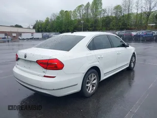 2016 Volkswagen Passat S with VIN 1VWAT7A38GC056495, listed as a IAAI auction lot 41965717 with 163,254 mi miles and . Bid and sale history available at DreamBid. Image 4.