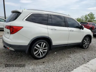 2016 Honda Pilot Touring with VIN 5FNYF6H92GB057531, listed as a Copart auction lot 54354145 with 86,806 mi miles and Salvage Title. Bid and sale history available at DreamBid. Image 3.