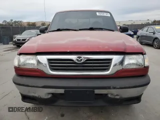 2000 Mazda B-Series 2WD Truck SX with VIN 4F4YR12C2YTM30989, listed as a Copart auction lot 88946185 with 250,368 mi miles and Salvage Title. Bid and sale history available at carsss.com. Image 5.