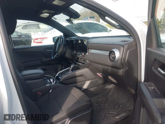 2023 Chevrolet Colorado 2WD LT with VIN 1GCGSCEC8P1206281, listed as a IAAI auction lot 41086343 with 12,972 mi miles and . Bid and sale history available at DreamBid. Image 5.