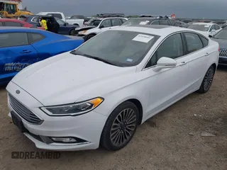 2017 Ford Fusion Titanium z VIN 3FA6P0K96HR124146, wystawiony jako IAAI lot #42428041 z przebiegiem 204 306 mil mil oraz . Historia ofert i sprzedaży dostępna na DreamBid. Obrazek 17.
