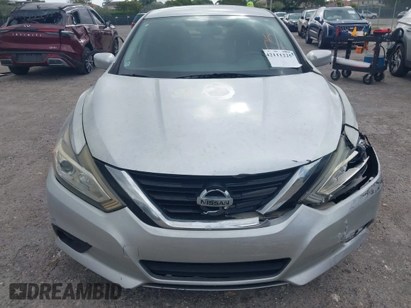 2017 Nissan Altima SV with VIN 1N4AL3AP7HC188945, listed as a IAAI auction lot 42111225 with 157,185 mi miles and . Bid and sale history available at carsss.com. Image 12.