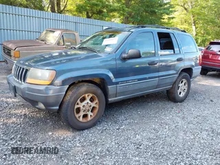 2001 Jeep Grand Cherokee Laredo with VIN 1J4GW48SX1C585867, listed as a IAAI auction lot 42793657 with 197,167 mi miles and . Bid and sale history available at DreamBid. Image 2.