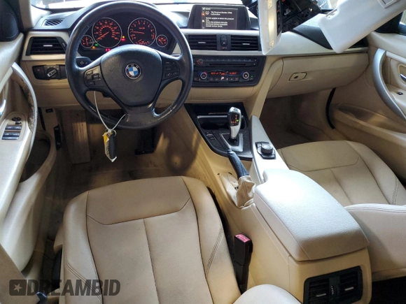 2014 BMW 3 Series 320i with VIN WBA3B1G5XENT00747, listed as a Copart auction lot 64737935 with 123,374 mi miles and Salvage title. Bid and sale history available at DreamBid. Image 8.