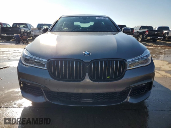 2019 BMW 7 Series 750i with VIN WBA7F0C59KGM25051, listed as a Copart auction lot 87285534 with Not Provided miles and Salvage Title. Bid and sale history available at DreamBid. Image 5.