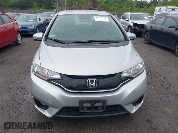 2015 Honda Fit EX-L z VIN 3HGGK5H82FM713988, wystawiony jako IAAI lot #42517762 z przebiegiem 56 169 mil mil oraz . Historia ofert i sprzedaży dostępna na DreamBid. Obrazek 12.